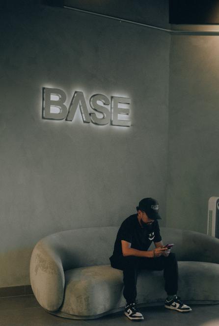 Base employee sitting at entrance