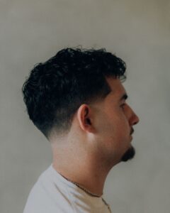 Man with curly hair